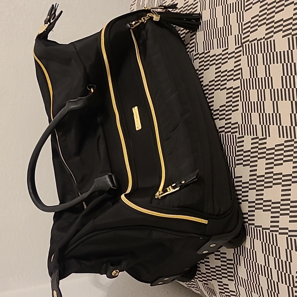 Steve Madden Rolling Duffel Bag